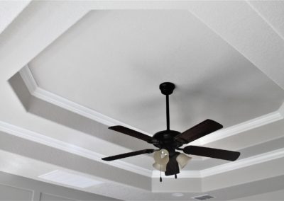 Double Tray Octagon Step Ceiling with Crown Moulding and Bronze Ceiling Fan