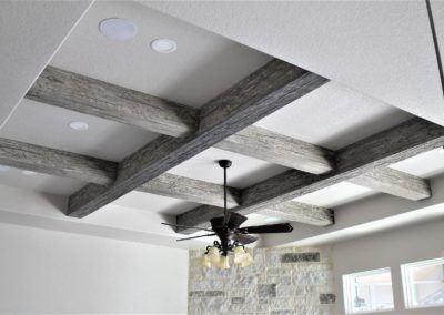 Gray Wood Beams. Garden Ridge Texas custom home ceiling beams. Gray wood beams installed in a coffered ceiling design