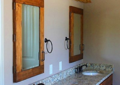 Bath vanity with double sinks and double recessed mirrored medicine cabinets