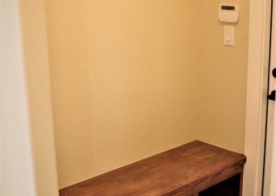 Mudroom Bench with storage underneath and coat rack on wall above