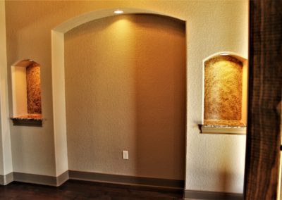 Wall Niches. Large floor to ceiling niche with small side niches in entry foyer of home