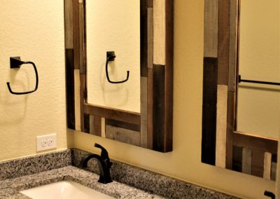 Bathroom vanity mirrors with multi colored wood frames and multi colored vanity top