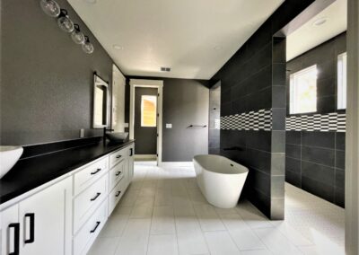 modern home master bathroom with free standing bathtub and large walk-in shower
